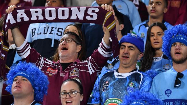 A Queensland fan among NSW supporters at Suncorp. Picture: AAP