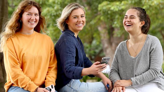 University students Kate Pickard, Lauren McGrath-Wild and Sophie Bell (L-R) have concerns about a proposed app which would record consent for sexual activity. Picture: Toby Zerna