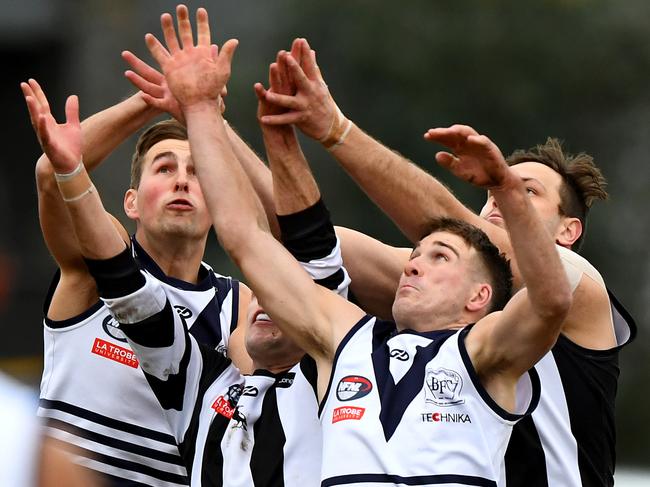 Bundoora and Montmorency players fly for the ball. Picture: Josh Chadwick