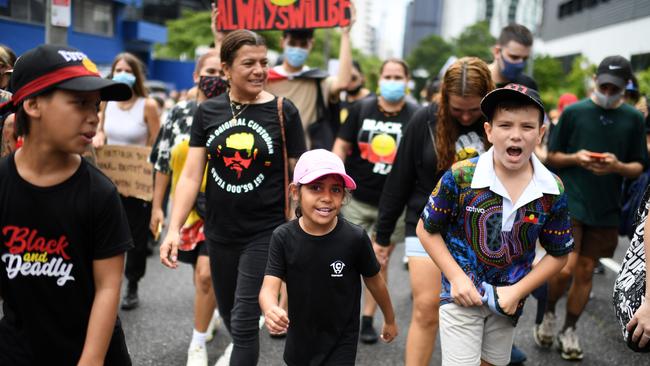 Kids lead the way during an Invasion Day rally in Brisbane on Wednesday. Picture: Dan Peled