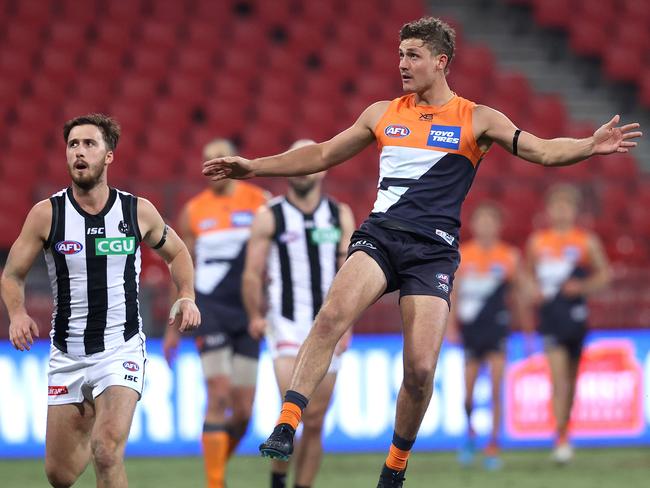 Harry Perryman kicks a goal against Collingwood in 2020. Picture. Phil Hillyard