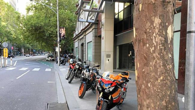 Footpath motorcycle parking already exists in city areas. Picture: Contributed