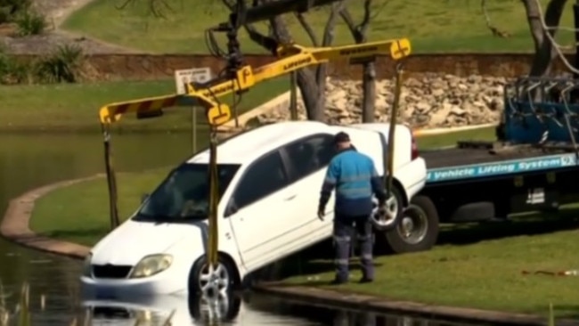 The Toyota Corolla being retrieved from the lake. Picture: 7 News