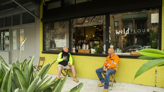 Customers observe social distancing at a Redfern cafe in Sydney on Thursday. Picture: Getty Images