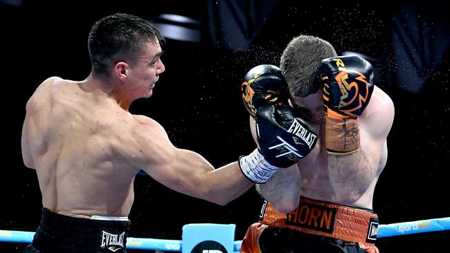 Tim Tszyu slips one through to rattle Jeff Horn.