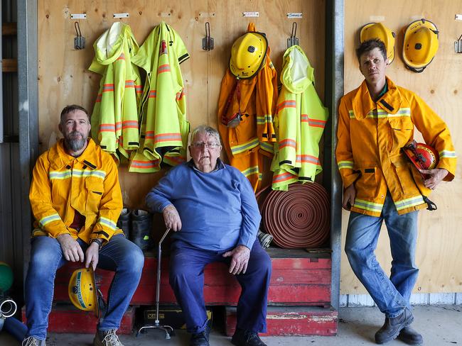 Lieutenant Brad Missen , Secretary Hughie Stag and Captain Ton Van Dijk inside the Winnindoo Fire Brigade station. Picture: Ian Currie