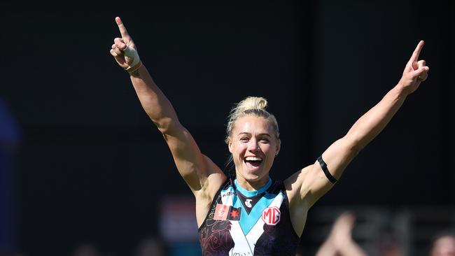 Phillips celebrates for the Power last season. Picture: Sarah Reed/AFL Photos via Getty Images