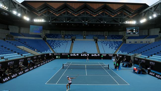 Ash Barty and Ekaterina Alexandrova battle it out in a near-empty stadium. Picture: Michael Klein.