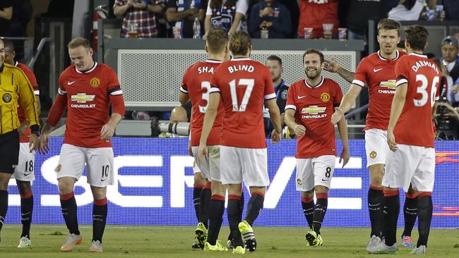 Juan Mata greeted by his teammates after scoring the first goal against the San Jose Earthquakes.