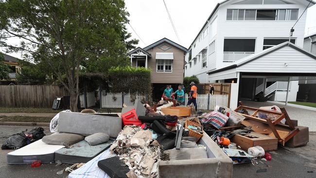 Cleaning up in Vincent St, Auchenflower. Picture: Annette Dew