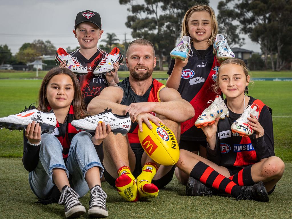 Challenge ambassador Stringer with Challenge kids Bella, Nate, Katie and Rosie. Picture: Jake Nowakowski