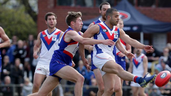 Ahmed Saad gets a kick away before he was injured during Sunday’s preliminary final.