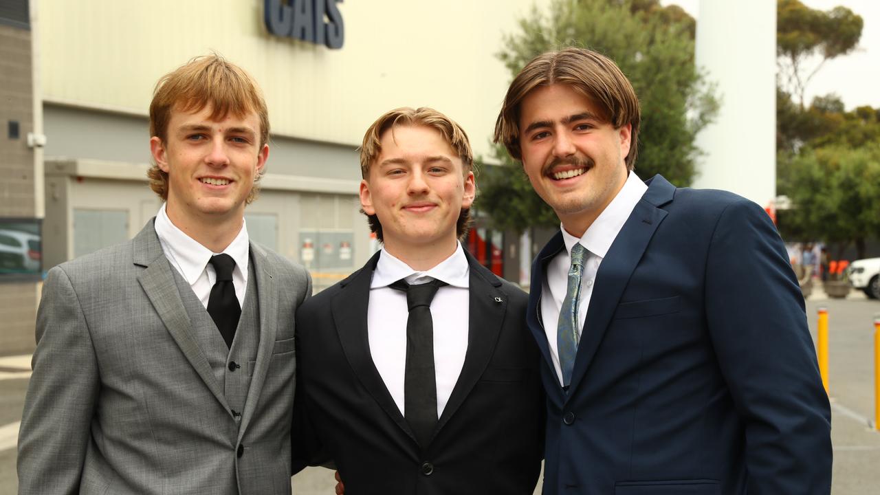 Tully Searle, Athan Holland and Harry Irvin at the Belmont High School year 12 graduation at GMHBA Stadium. Picture: Alison Wynd