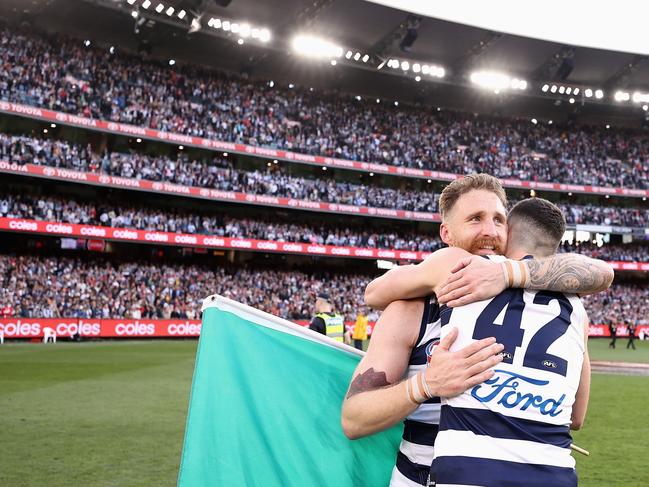 Irish Cats Zach Tuohy and Mark O'Connor enjoy the premiership Picture: Cameron Spencer/AFL Photos/via Getty Images