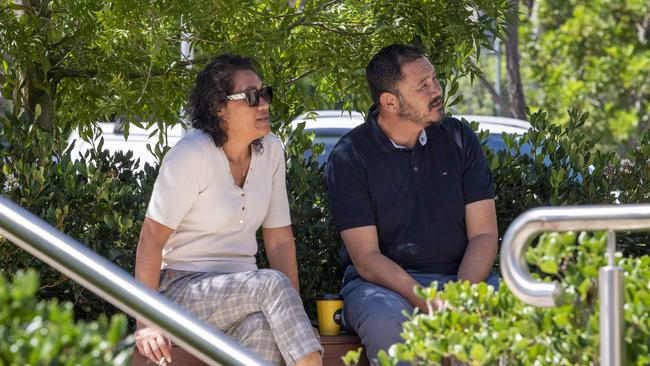 Titmuss’ parents sit outside the cafe during a break of the inquest into their son’s death.