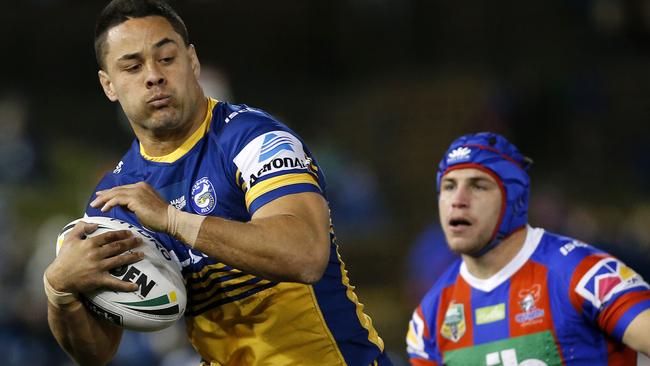 Jarryd Hayne of the Eels is tackled during the Round 18 NRL match between the Newcastle Knights and the Parramatta Eels at McDonald Jones Stadium in Newcastle, Friday, July 13, 2018. (AAP Image/Darren Pateman) NO ARCHIVING, EDITORIAL USE ONLY