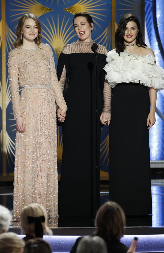 Stone with Olivia Colman and Rachel Weisz onstage at the Golden Globe Awards. Photo: Paul Drinkwater/NBCUniversal via Getty Images