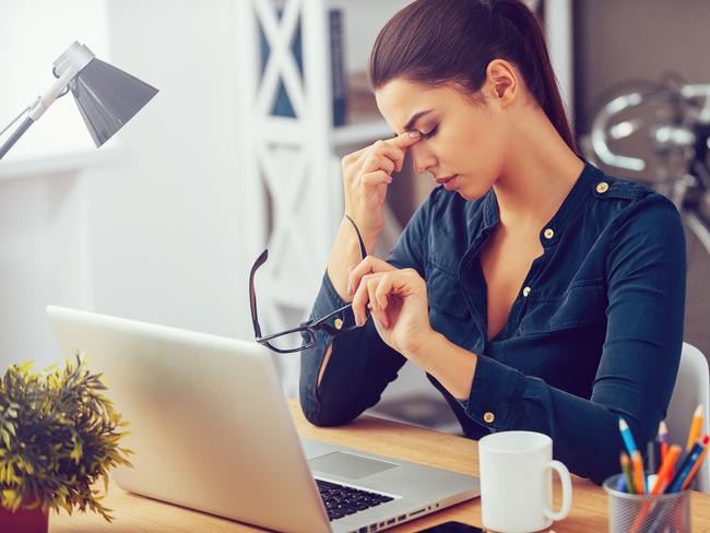 Stock image of stressed woman for wellbeing column in Gold Coast Eye