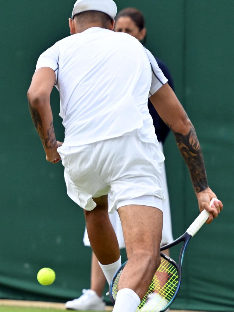 Kyrgios plays his trademark shot through his legs. Picture: Glyn Kirk / AFP