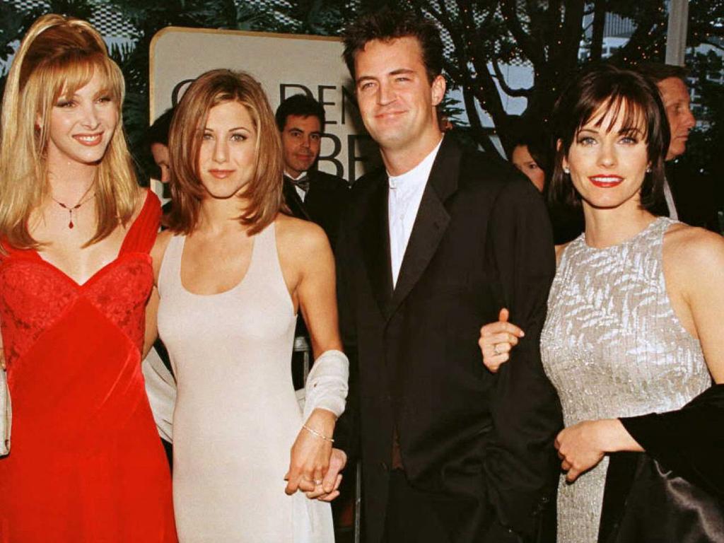 Matthew Perry with Friends co-stars Lisa Kudrow, Jennifer Aniston, and Courteney Cox at the Golden Globes in 1996. Picture: AFP