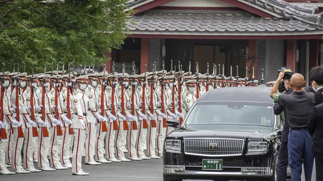 A car carrying the body of Japan's former prime minister Shinzo Abe leaves Zojoji temple where his funeral was held in July. Picture: Getty Images