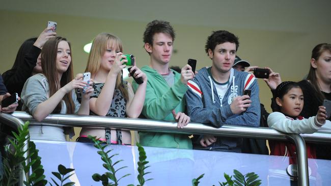 Westfield balconies are makeshift mezzanine levels when stars perform. These fans turned out to see Ricki-Lee Coulter in 2012. Picture: Brent McGilvary