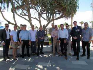 IN HONOUR: Soldiers who served alongside Sapper Rowan Robinson in Afghanistan joined his father Peter Robinson (sixth from right) and Brad Butson from Brothers Cafe (2nd from right) at the official opening of Rowan Robinson Park. Picture: Nikki Todd