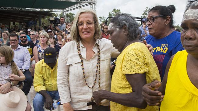 Lucy Turnbull is overcome as she embraces Eunice Yunupingu, aunt of recently deceased Dr G Yunupingu, at the opening of the Garma festival in Arnhem Land. Picture: Melanie Faith Dove.