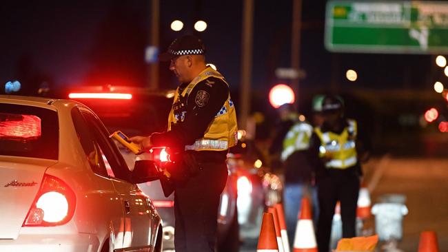 Police officers conduct random breath test on Port Wakefield Road in Mawson Lakes. Picture: Tom Huntley