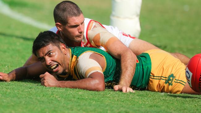 Shannon Rioli is pinned by Waratah’s Liam O'Connor in a rare positive for the red and whites who were thrashed by St Mary’s on a day where the Rioli family reached 1000 combined games in the green and gold jumper. Picture: GLENN CAMPBELL