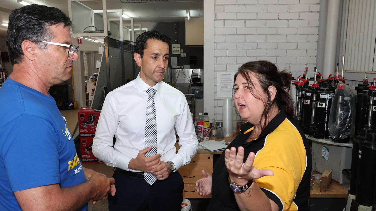 Leader of the Opposition David Crisafulli and John Barounis, LNP candidate for Maryborough talking with victim of crime Belinda Earle, Earles Paint Place, Maryborough. Picture: Liam Kidston