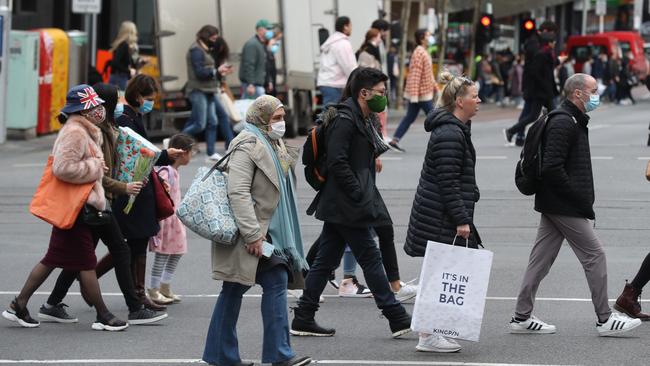 People in Swanston Street after Melbourne continues to recover from latest Covid lockdown. Picture: NCA NewsWire / David Crosling