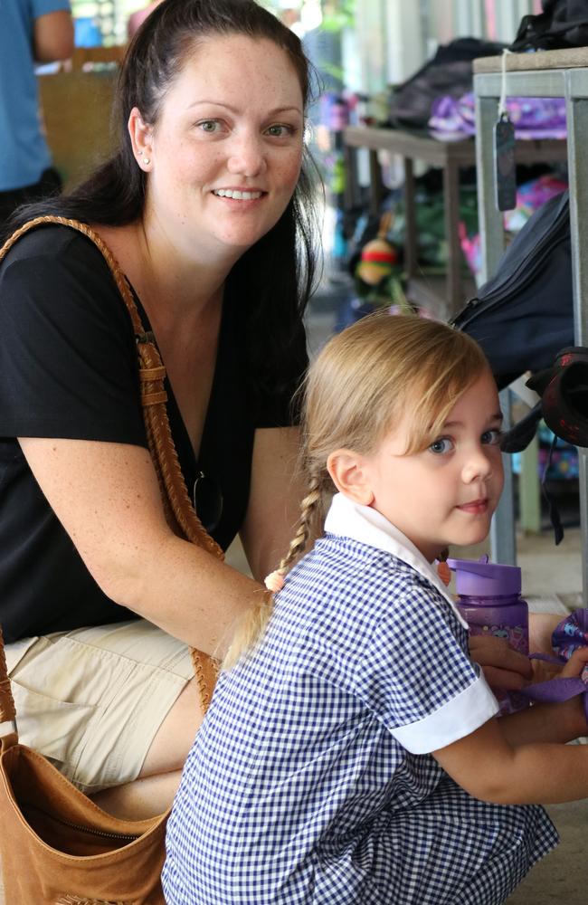 Mila Baldry, with mum Melissa Baldry, puts her bag away during her first day of prep at the Coolum State School in Coolum Beach on January 22. Picture: Letea Cavander