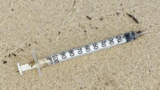 A needle found at James Overell Park in Southport near a homeless camp.