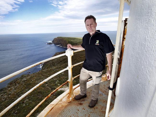 Craig Parsey takes in the view from the Cape Bruny lighthouse, where he lived as a child. Picture: KIM EISZELE