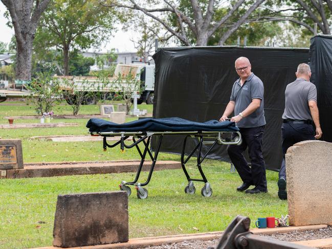 The body of the baby sent in the mail was exhumed from Darwin General Cemetery on Wednesday, with hopes a DNA match could finally uncover his identity. Picture: Pema Tamang Pakhrin