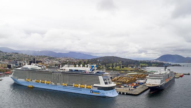 The Ovation Of The Seas, left, and the MS Noordam docked in Hobart in 2018.