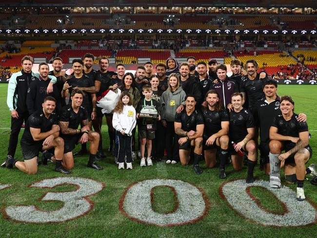 BRISBANE, AUSTRALIA - JUNE 07: AdamÃÂ Reynolds of the Broncos poses with family and team mates after his 300th match during the round 14 NRL match between Brisbane Broncos and Gold Coast Titans at Suncorp Stadium, on June 07, 2025, in Brisbane, Australia. (Photo by Chris Hyde/Getty Images)