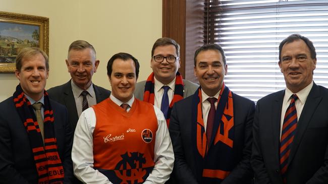 Redlegs take over the Parliament: L-R Morphett MP and former Norwood player Stephen Patterson. John Dawkins, Speaker Vincent Tarzia, Education Minister John Gardner, Premier Steven Marshall and Flinders MP Peter Treloar.