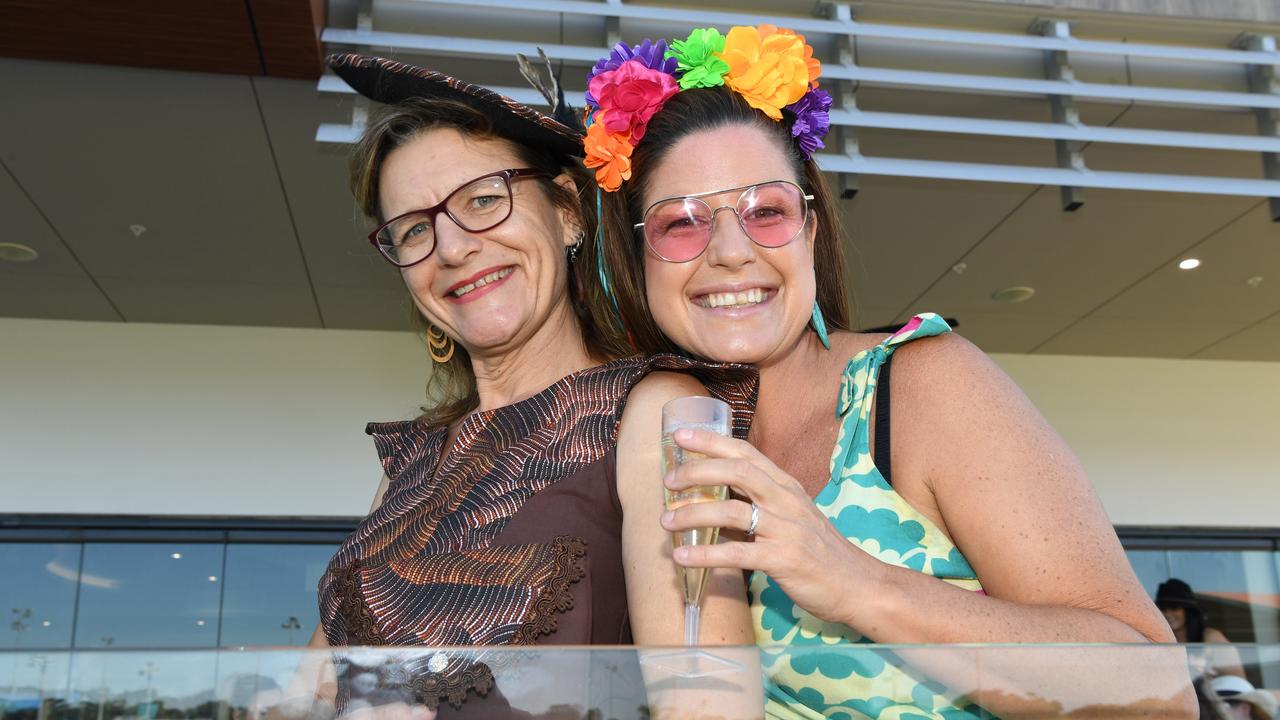 Christine Isaacs and Alex Marshall at the Darwin Turf Club Bridge Toyota Ladies' Day / Derby Day. Picture: KATRINA BRIDGEFORD