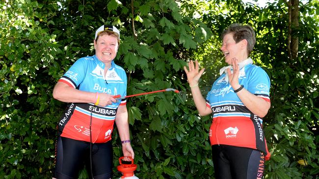 Carol Moore and Michele Bryant rode 70km of the cancelled Bupa Challenge Tour, but took extra precautions against the heat. Picture: Bernard Humphreys