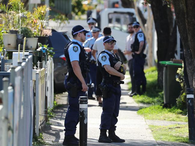 Police patrol around the funeral for slain underworld figure Tarek Ayoub at Lakemba Mosque on Friday.