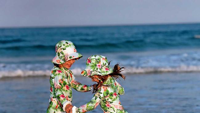 WINNING: Bargara mum Emily Gradon saw the need to protect her daughters Anelise and Lilia from the sun, now her business Tribe Tropical has earned a Good Design Australia award. Picture: Cassandra Kirk Photography