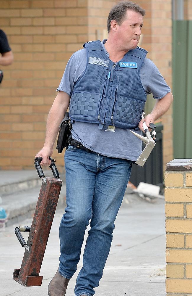 Police raid a home at Altona North as part of raids targeting an alleged organised crime syndicates. Picture: Nicole Garmston