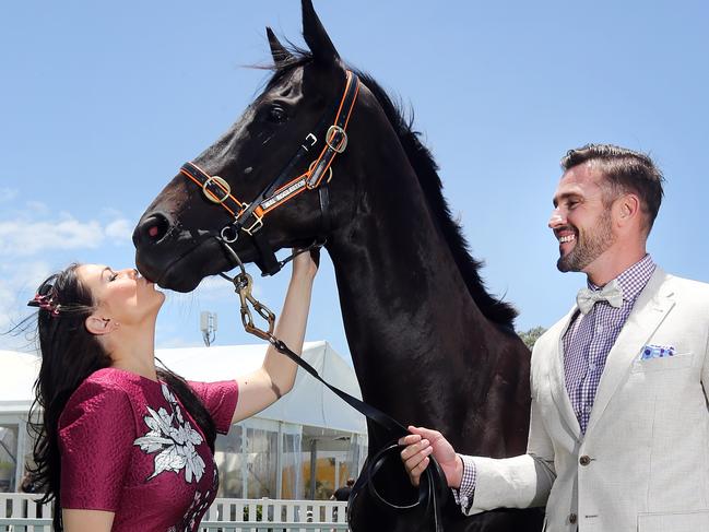 Media Call at Gold Coast Turf Club ahead of the Magic Millions tomorrow. Photo of Milliner Viktoria Novak and Myer Ambassador Kris Smith with race horse Nakanai. Pic by Richard Gosling