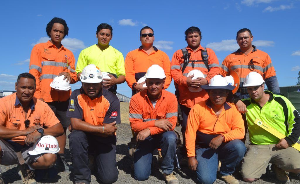 Kiwi construction contractors (back, from left) Wayne Faapito, Blake Kefu, Andrew Manu, Armine Kay, Ralph Williams, (front, from left) Tee Kefu, Mafi Kefu, Matthew Hapeta and Rob Leilua helped to lift a car off a man near Yuleba. They are pictured with fellow worker Ardelius Mitchell (front, far right). Picture: Contributed