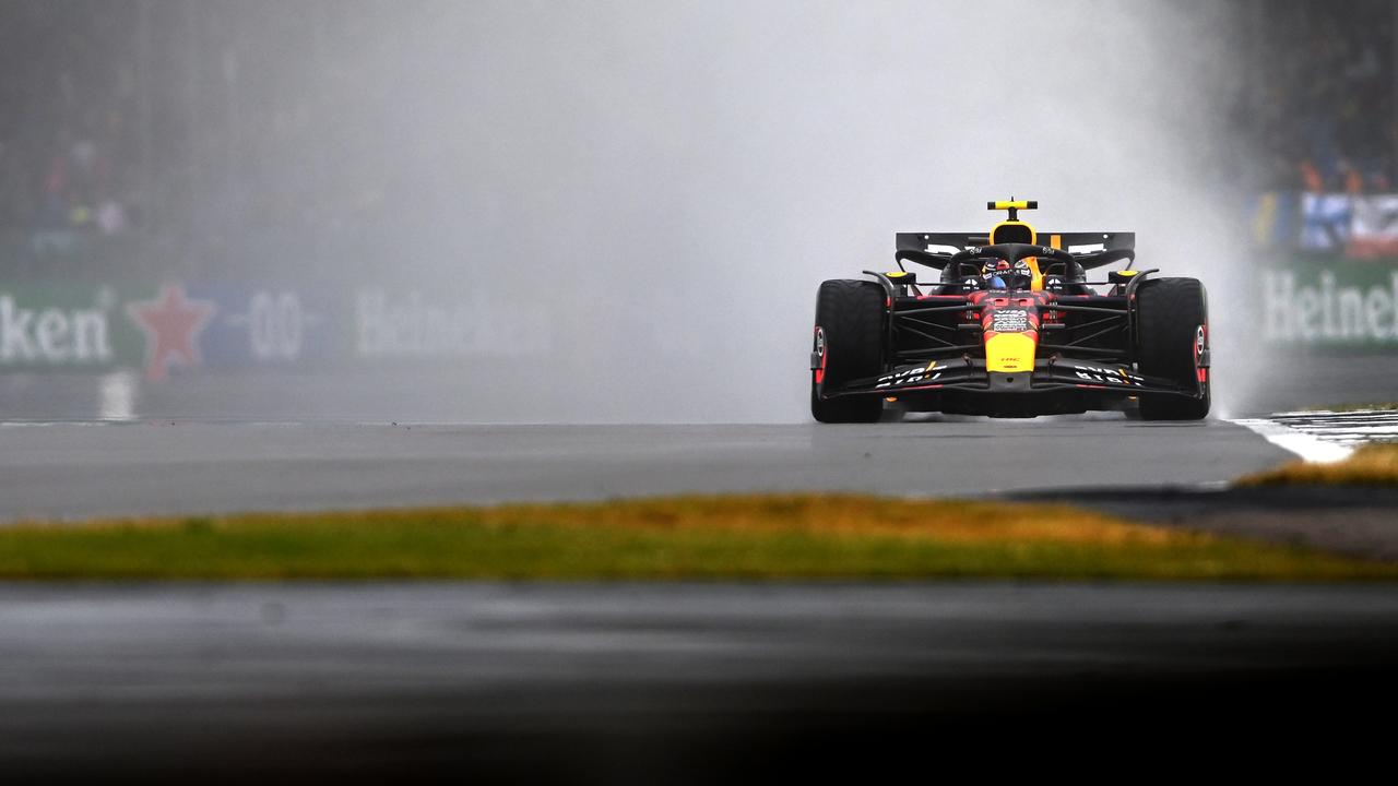 Sergio Perez in the wet. Photo by Rudy Carezzevoli/Getty Images.