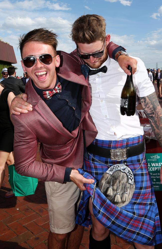 Melbourne Cup Day 2014 at Flemington Racecourse. Punters start to get a little raucous after the Cup. Picture: Mark Stewart