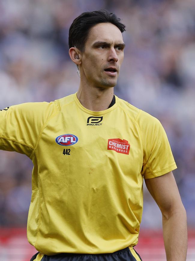 Umpire Justin Power.