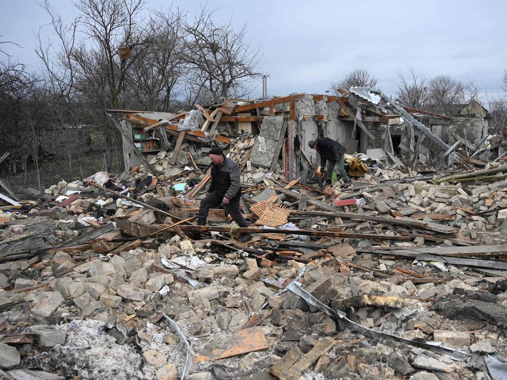 People search the rubble of a house following a Russian strike in the village of Velyka Vilshanytsia, some 50km from Lviv. Picture: AFP